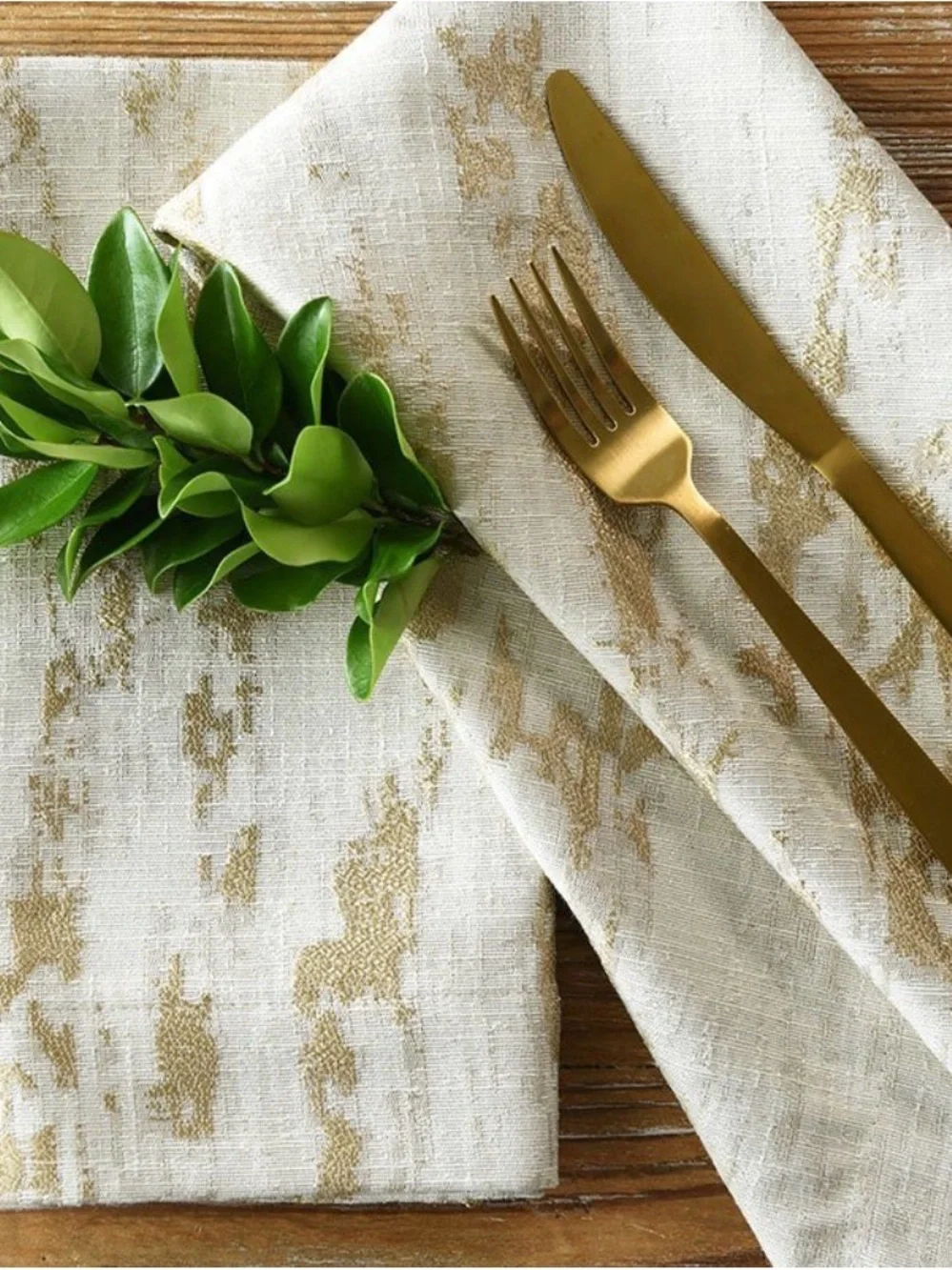 11 West Elm linen napkins gold metallic accent